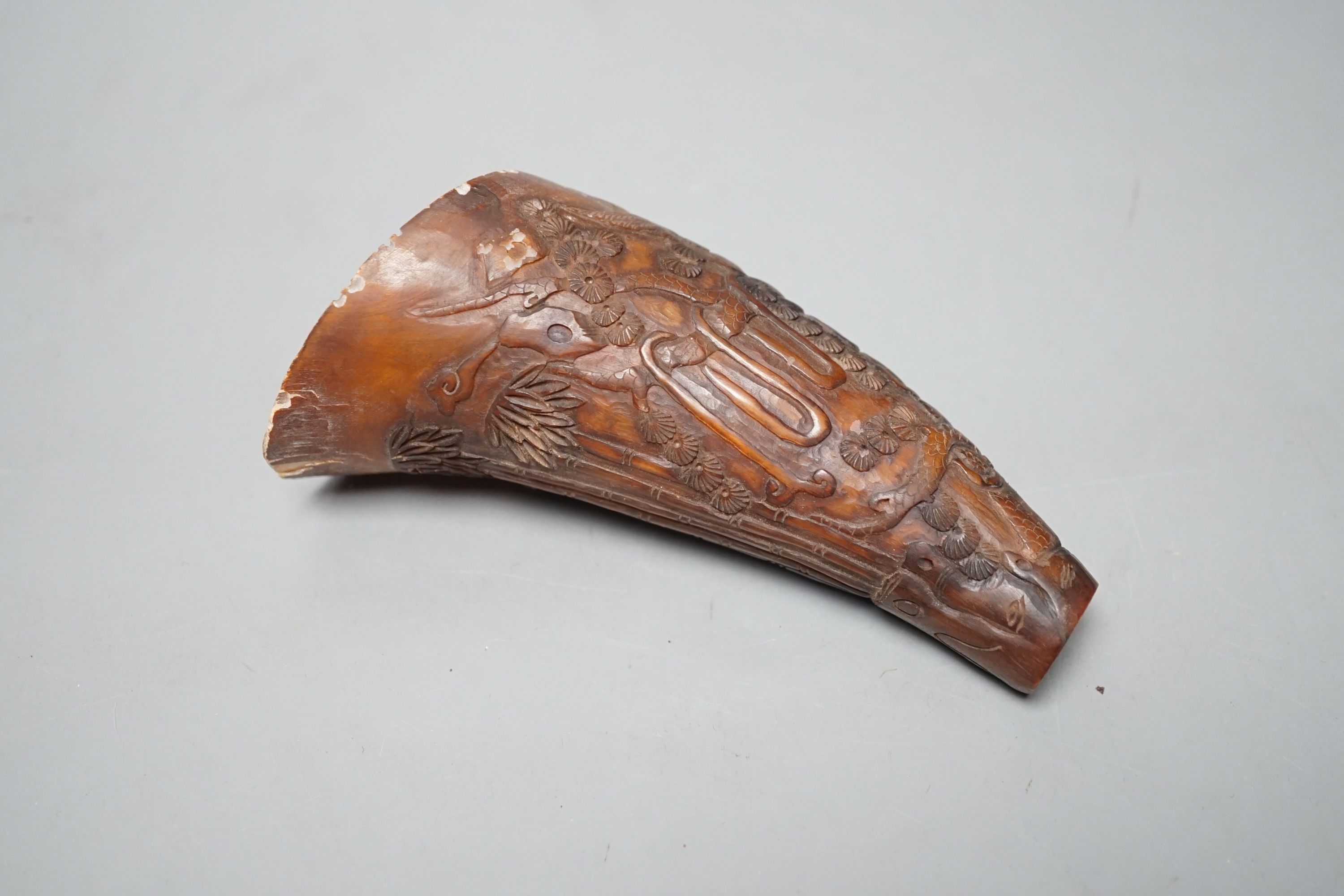 A Chinese carved horn cup 13cm